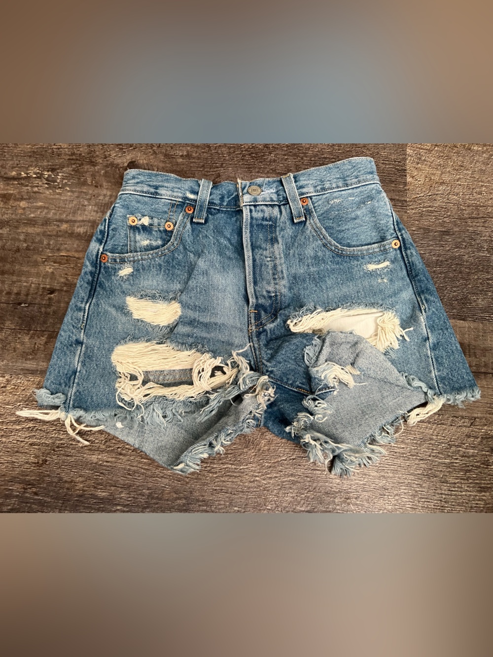 Levi’s High-Rise Distressed Denim Cutoff Shorts - Blue